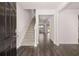 Bright and airy entryway with stairs and wood-look floors at 4107 Spencer Trl, Stonecrest, GA 30038