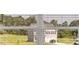 View of house exterior from a distance at 4107 Spencer Trl, Stonecrest, GA 30038