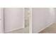 Bright hallway with carpeted floors and neutral-colored walls at 4107 Spencer Trl, Stonecrest, GA 30038