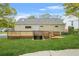 Cozy house featuring a wooden deck overlooking a well-maintained backyard at 1159 Fair Sw St, Atlanta, GA 30314