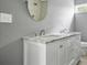Bathroom featuring double vanity, framed mirror, and tile flooring at 1159 Fair Sw St, Atlanta, GA 30314