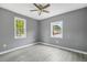 Sunny bedroom with hardwood floors and bright windows at 1159 Fair Sw St, Atlanta, GA 30314