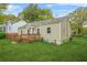 Side view of home showcasing the wooden deck and well-manicured lawn at 1159 Fair Sw St, Atlanta, GA 30314