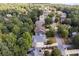 Aerial view of houses in a wooded neighborhood at 216 Crescent Moon Way, Canton, GA 30114