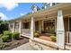 Inviting front porch with double doors and fall decor at 216 Crescent Moon Way, Canton, GA 30114