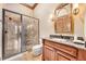 Bathroom features a single vanity and a glass enclosed shower at 2867 Darlington Run, Duluth, GA 30097