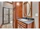 Stylish bathroom with granite vanity, tile shower, and ample storage at 2867 Darlington Run, Duluth, GA 30097