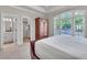 Bedroom with large window, walk in closet, and en suite bath at 2867 Darlington Run, Duluth, GA 30097
