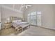 Bright bedroom with a vaulted ceiling, arched windows and doors, and a mirrored king bed set at 2867 Darlington Run, Duluth, GA 30097