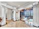 Expansive foyer with marble floors, decorative columns, and view into the living room at 2867 Darlington Run, Duluth, GA 30097