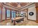 Wood-paneled game room with pool table, dart board, and access to the fitness area at 2867 Darlington Run, Duluth, GA 30097