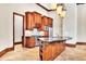 Chef's kitchen featuring a large island with bar seating, stainless appliances, and ample cabinet space at 2867 Darlington Run, Duluth, GA 30097