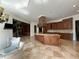Open kitchen with a large island and seamless access to the Gathering room for entertaining at 2867 Darlington Run, Duluth, GA 30097