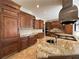Well-appointed kitchen with custom cabinetry, granite countertops, and stainless steel appliances at 2867 Darlington Run, Duluth, GA 30097