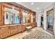 Spacious bathroom with dual sinks, jacuzzi tub, large mirrors and walk-in shower at 2867 Darlington Run, Duluth, GA 30097