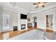 Main bedroom with fireplace, sitting area and hardwood floors at 2867 Darlington Run, Duluth, GA 30097
