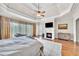Main bedroom with fireplace and exterior access at 2867 Darlington Run, Duluth, GA 30097