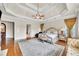 Spacious main bedroom with hardwood floors, tray ceiling, and ample natural light at 2867 Darlington Run, Duluth, GA 30097