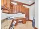 Office with built-in wooden cabinets, granite countertops and tile floors at 2867 Darlington Run, Duluth, GA 30097