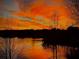 Scenic sunset view over the lake with colorful sky and reflections on the water for a tranquil community setting at 2867 Darlington Run, Duluth, GA 30097