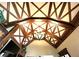Vaulted ceiling with wooden beams and chandelier at 2867 Darlington Run, Duluth, GA 30097