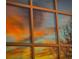 Reflection of beautiful sunset sky seen through the window, offering a tranquil view for community residents at 2867 Darlington Run, Duluth, GA 30097