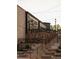 Stylish commercial building with stone accents, black trim, and string lights creating an inviting atmosphere at 628 Skytop Dr # 158, Cumming, GA 30040