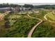 Scenic community park featuring a walking path, a mini golf area, and landscaped green spaces perfect for outdoor activities at 628 Skytop Dr # 158, Cumming, GA 30040