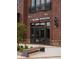 The Good Vibes Nutrition store front with brick facade, bench seating, and street-level access at 628 Skytop Dr # 158, Cumming, GA 30040
