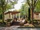 Scenic park area with a pergola, stone pillars, manicured landscaping, and walking path at the property at 628 Skytop Dr # 158, Cumming, GA 30040
