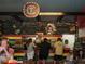 A lively taqueria setting showcasing a chalkboard menu and colorful decor above the ordering counter at 628 Skytop Dr # 158, Cumming, GA 30040