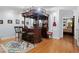 Basement wet bar with wood cabinetry and leather barstools at 11 York Trce, Cartersville, GA 30121