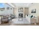 Inviting living room featuring a fireplace, stylish seating, and plenty of natural light at 248 Persimmon Dr, Holly Springs, GA 30115