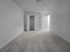 Spacious bedroom featuring plush carpeting and a large closet for ample storage at 4106 Dahlgreen Way, Decatur, GA 30032