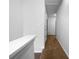 Upstairs hallway with neutral walls and carpet leading to the various rooms on the upper level at 4106 Dahlgreen Way, Decatur, GA 30032