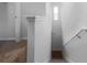 Bright stairway with natural light and neutral wall paint, providing a seamless transition between floors at 4106 Dahlgreen Way, Decatur, GA 30032