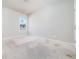 Bedroom with carpet, window for natural light, and a closet space with a door at 1068 W Union Grove Cir, Auburn, GA 30011