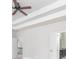 Hallway with a view of the bathroom and stairs with a ceiling fan in view at 1068 W Union Grove Cir, Auburn, GA 30011