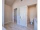 Bathroom with toilet and access to walk-in closet at 303 Retreat Way, Carrollton, GA 30116