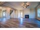 Spacious living room featuring a fireplace and hardwood floors at 303 Retreat Way, Carrollton, GA 30116