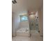 Main bathroom with walk-in shower and soaking tub at 111 Henley St, Canton, GA 30114