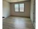 Bonus room with hardwood floors and two windows at 111 Henley St, Canton, GA 30114