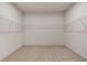 Walk-in closet with wire shelving, offering ample storage space at 111 Henley St, Canton, GA 30114