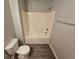 This bathroom features a bathtub with toilet at 500 Mica Trce, South Fulton, GA 30349