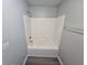 This bathroom features a bathtub with plastic surround at 500 Mica Trce, South Fulton, GA 30349