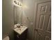 A vanity in a neutral painted half-bath at 500 Mica Trce, South Fulton, GA 30349