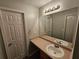 This bathroom features a vanity, mirror, and neutral paint at 500 Mica Trce, South Fulton, GA 30349