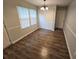 The dining room features hardwood floors, ample lighting, and neutral paint at 500 Mica Trce, South Fulton, GA 30349
