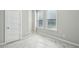 Bedroom with large windows that allow for natural light at 1095 Tucker Ave # 401, Atlanta, GA 30310