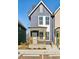Charming two-story home with blue siding, a welcoming front porch, and manicured lawn at 1095 Tucker Ave # 401, Atlanta, GA 30310